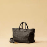 The Cabas Medium by LABEL17 is a lightweight handbag crafted from supple, vegetable-tanned nappa leather. Hand-braided and finished with a zip closure and detachable shoulder strap, it features a leather-lined interior with a secure inner pocket – combining refined design with everyday functionality. 