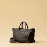 The Cabas Medium by LABEL17 is a lightweight handbag crafted from supple, vegetable-tanned nappa leather. Hand-braided and finished with a zip closure and detachable shoulder strap, it features a leather-lined interior with a secure inner pocket – combining refined design with everyday functionality. 